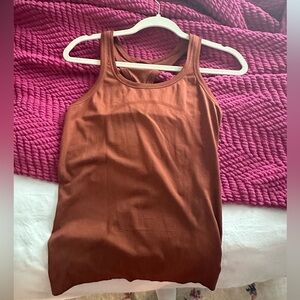 Burnt orange lululemon swiftly tank top